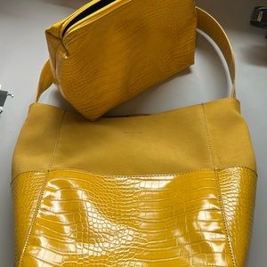 Purse and makeup bag. Brand new never used